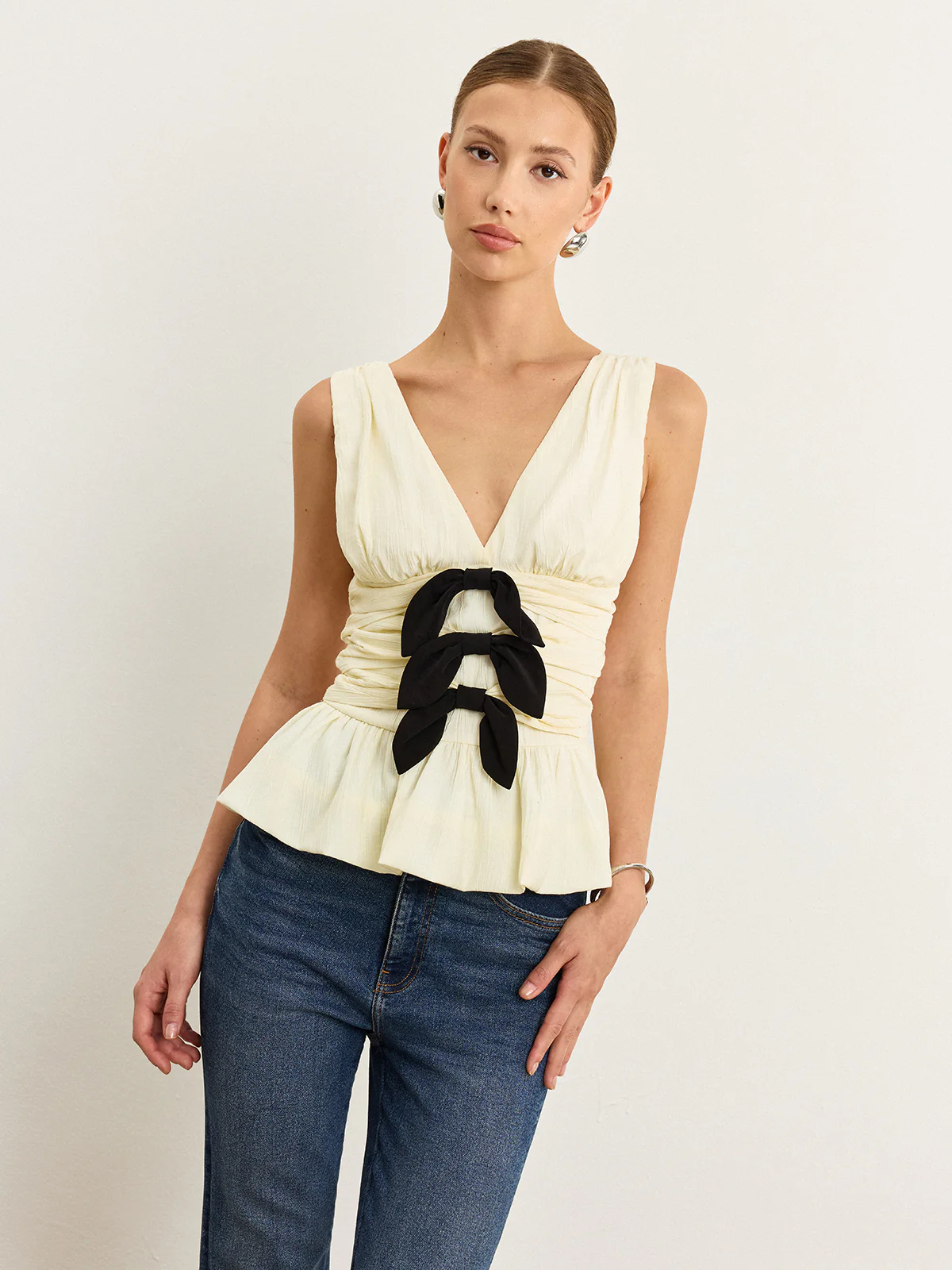 Bow-Detail Ruched Top with Peplum Hem - Takermore