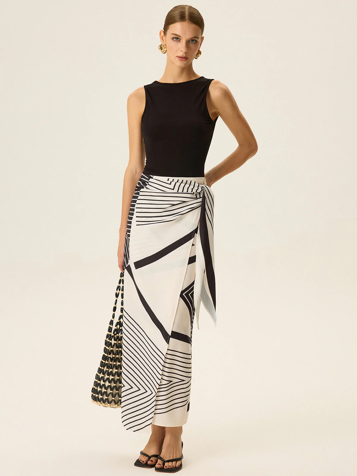 Sleeveless Top and Print Wrap Skirt Set - Takermore