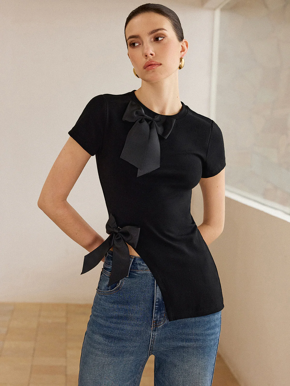 3D Bow-Detailed Top with Asymmetric Hem - Takermore