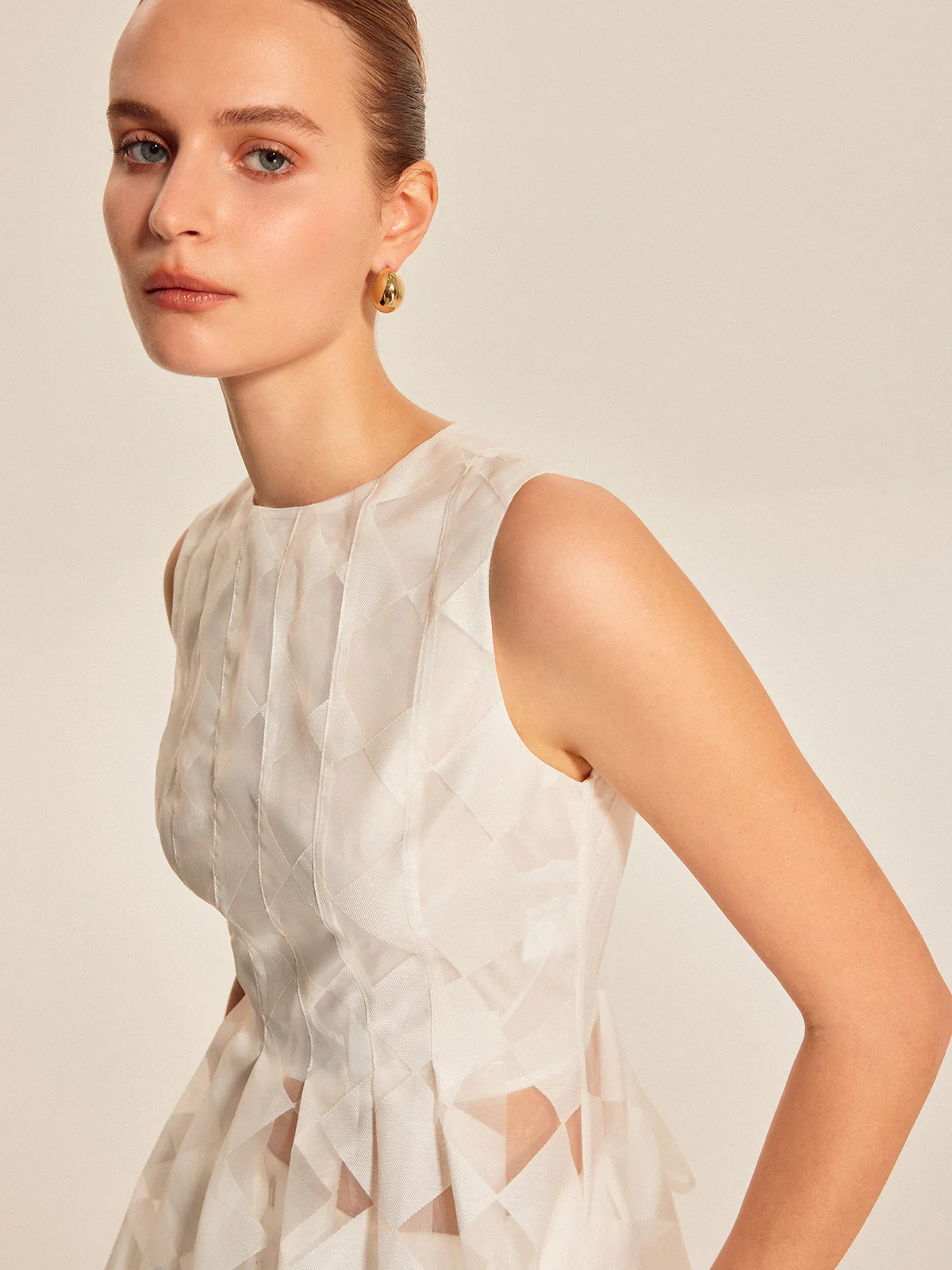 Semi-Sheer Geometric Peplum Top - Takermore